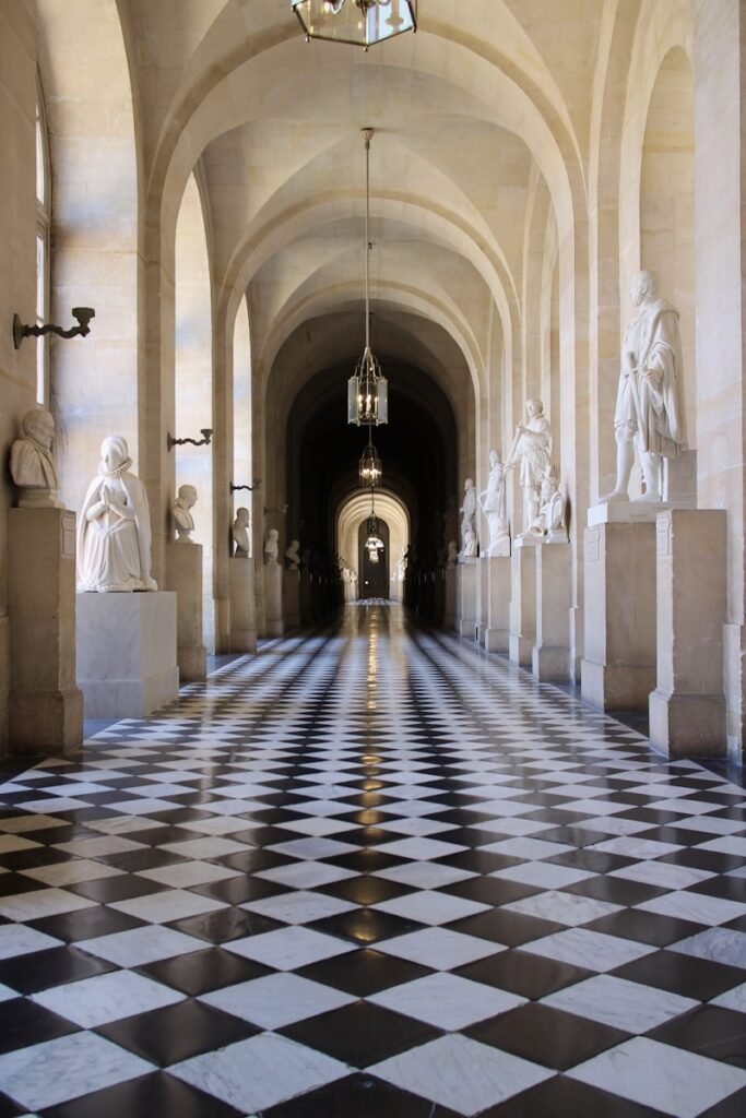 white and blue tiled hallway